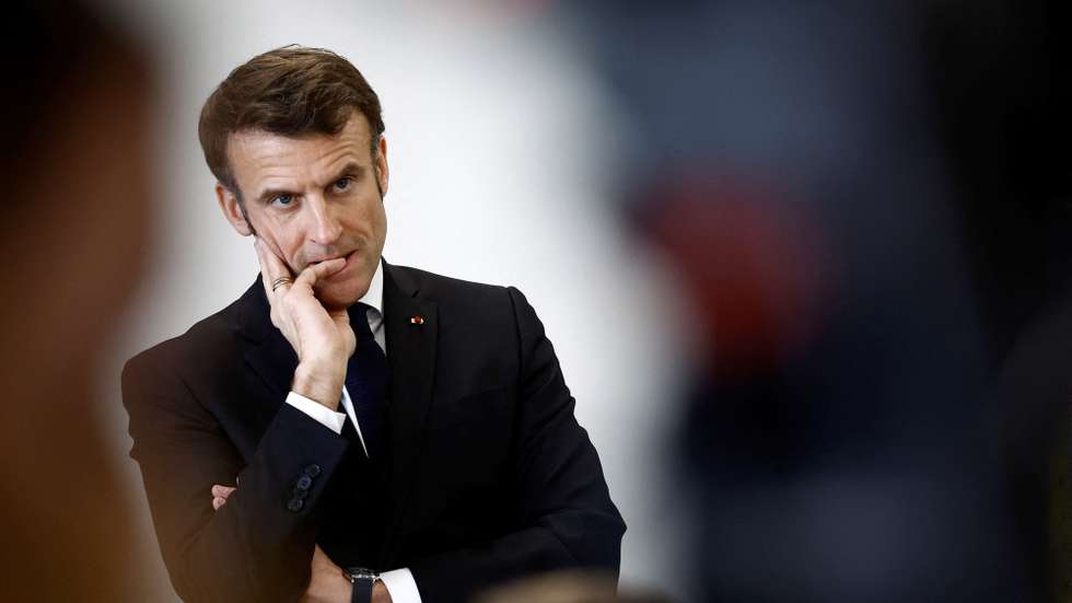 epa10495579 French President Emmanuel Macron talks with schoolchildren in a classroom during a prevention session on the papillomavirus (HPV infection) as he visits the College Jean Lartaut Middle School in Jarnac, France, 28 February 2023.  EPA/STEPHANE MAHE / POOL  MAXPPP OUT