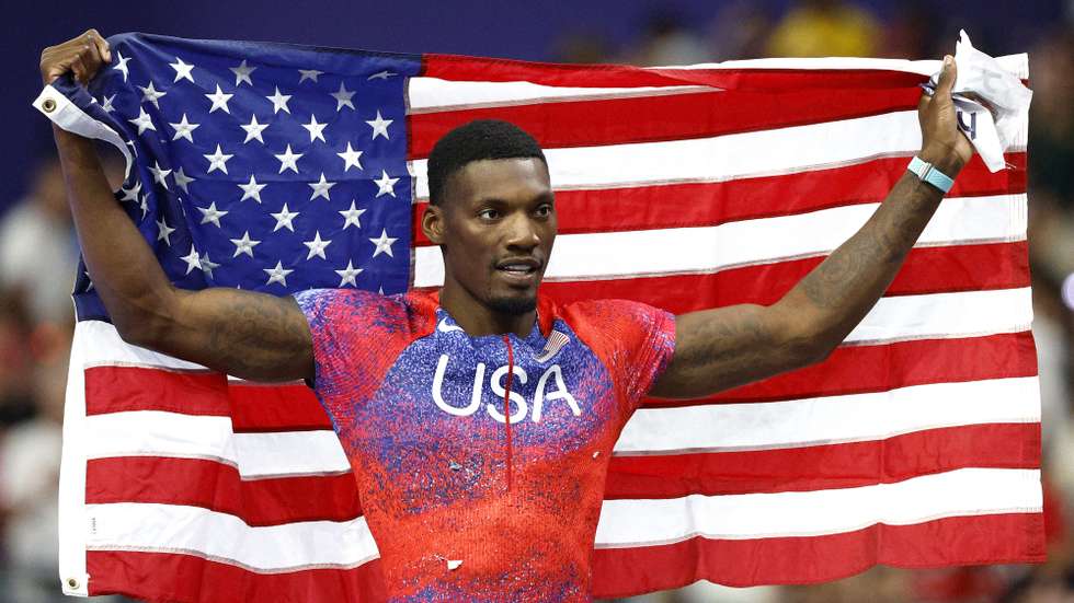 epa11526421 Fred Kerley of the USA celebrates after placing third in the Men 100m final of the Athletics competitions in the Paris 2024 Olympic Games, at the Stade de France stadium in Saint Denis, France, 04 August 2024.  EPA/FRANCK ROBICHON
