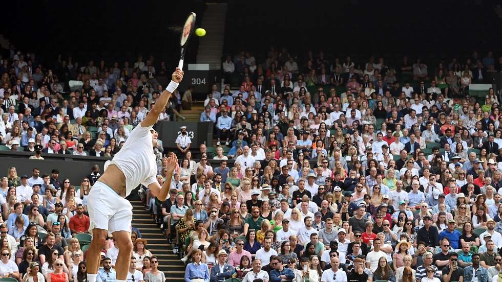 epa09316381 Roger Federer of Switzerland in action during his second round match against Richard Gasquet of France at the Wimbledon Championships, Wimbledon, Britain 01 July 2021.  EPA/FACUNDO ARRIZABALAGA   EDITORIAL USE ONLY    EDITORIAL USE ONLY  EDITORIAL USE ONLY
