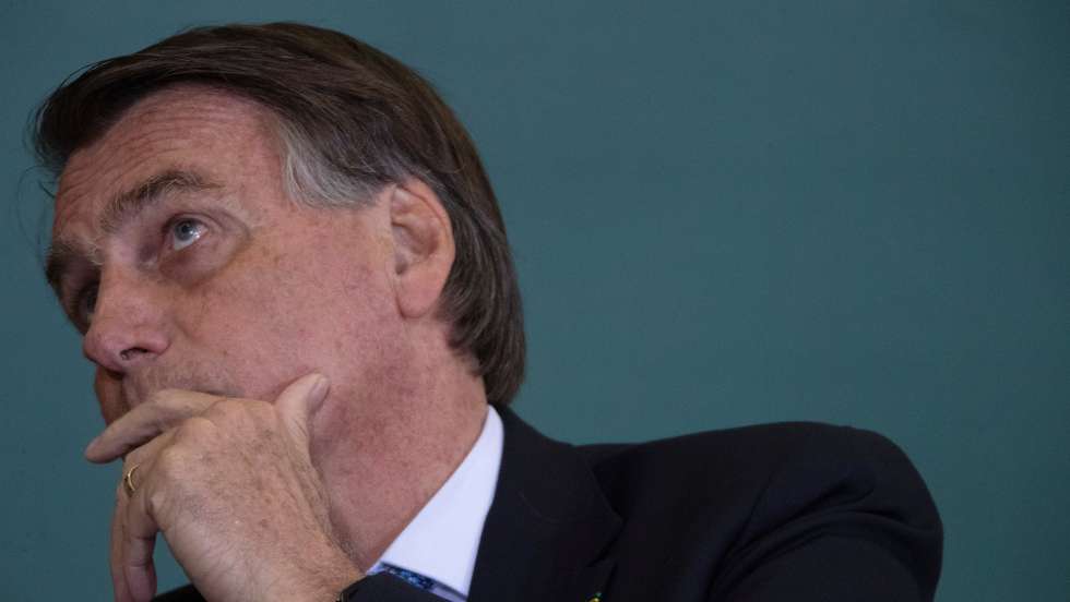 Jair Bolsonaro, presidente do Brasil, participa numa cerimónia de modernização da segurança e saúde no trabalho