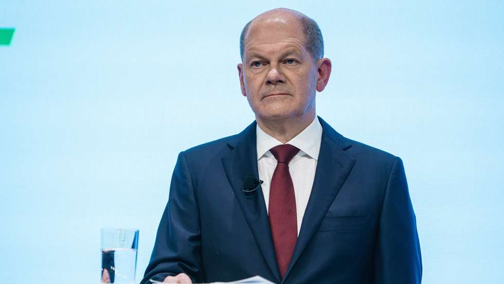 epa09600964 Acting German Minister of Finance and Social Democratic Party (SPD) top candidate for the federal elections Olaf Scholz looks on during the presentation of the coalition contract in Berlin, Germany, 24 November 2021. Members of German parties Social Democrats (SPD), Free Democrats (FDP ) and Greens were leading talks since German federal elections took place on 26 September 2021. On 24 November the participating parties are about to present the result of those talks, and the expected coalition contract.  EPA/CLEMENS BILAN