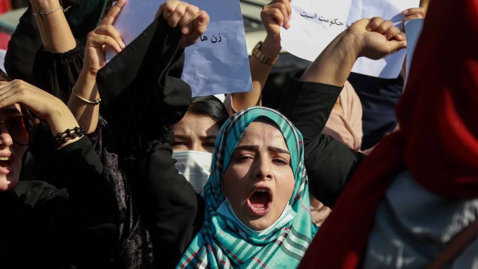 epaselect epa09535721 Afghan women shout slogans during a protest to demand that the Taliban government allow the reopening of girls schools and to provide ample employment opportunities, in Kabul, Afghanistan, 21 October 2021. The Taliban promised on 18 October 2021, that they would soon allow all girls to return to school, after not allowing them to access to education in secondary schools following their reopening a month ago. The ban on reopening schools for girls and young people has caused uncertainty among the Afghan people, with criticism from women's rights activists who fear returning to the dark era under the former Taliban regime between 1996 and 2001.  EPA/STRINGER