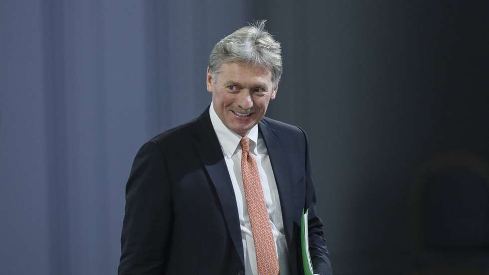 epa09654874 Kremlin spokesman Dmitry Peskov attends Russian President Vladimir Putin's annual life-broadcast news conference with Russian and foreign media at the Moscow Manege in Moscow, Russia, 23 December 2021. The President's Big Press Conference is an annual event that has been held since 2001. This year, the number of journalists was limited to 507 due to coronavirus.  EPA/YURI KOCHETKOV