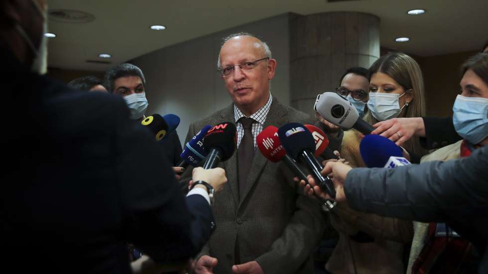 Portuguese Foreign Minister Augusto Santos Silva (C) talks to the journalists at Humberto Delgado Airport, in Lisbon, Portugal, 28 February 2022. Portuguese and Portuguese-Ukrainian citizens who left Ukraine in the last few days, organized by the Portuguese Embassy in Kiev, and some also by their own means, upon arrival in Lisbon on a flight from Bucharest.  Thousands of people desperately trying to leave Kyiv, the capital of Ukraine, which has been under Russian military assault. Russian troops entered Ukraine on 24 February prompting the country's president to declare martial law and triggering a series of severe economic sanctions imposed by Western countries on Russia. MANUEL DE ALMEIDA/LUSA