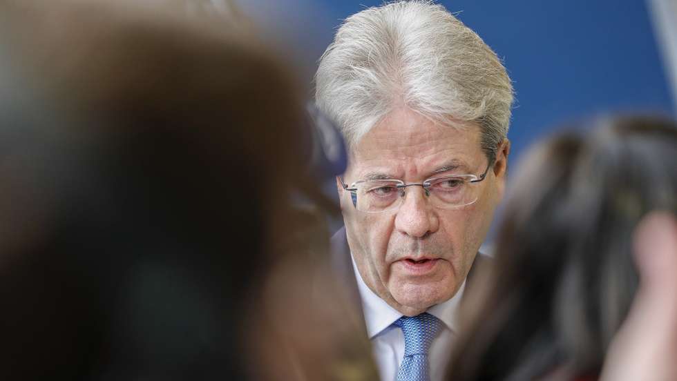 epa09870114 European Commissioners in charge of Economy Paolo Gentiloni speaks to the media as he arrives for the Finance Ministers meeting in Luxembourg, 04 April 2022. Ministers will discuss economic developments resulting from the Russian invasion of Ukraine.  EPA/JULIEN WARNAND