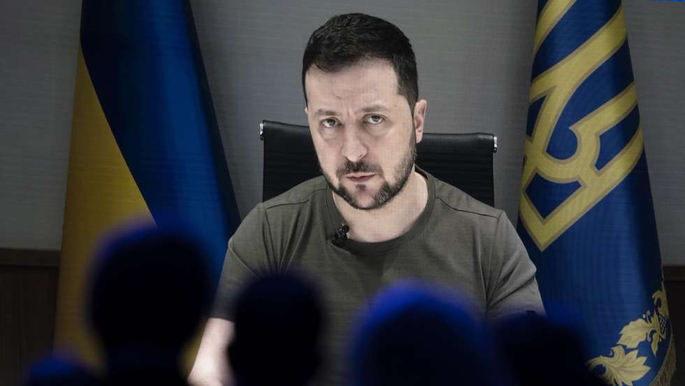 epa09968631 Ukrainian President Volodymyr Zelensky delivers an address via videolink during the opening plenary session of the 51st annual meeting of the World Economic Forum (WEF) in Davos, Switzerland, 23 May 2022. The forum has been postponed due to the COVID-19 pandemic and was rescheduled to early summer. The meeting brings together entrepreneurs, scientists, corporate and political leaders in Davos under the topic 'History at a Turning Point: Government Policies and Business Strategies' from 22 to 26 May 2022.  EPA/GIAN EHRENZELLER