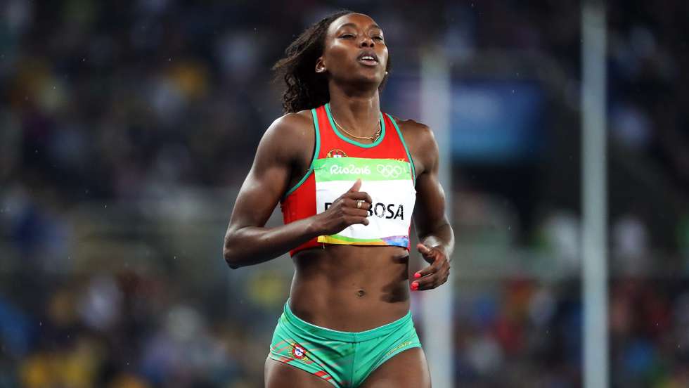 Vera Barbosa of Portugal reacts after competing during the women's 400m Hurdles heats of the Rio 2016 Olympic Games Athletics, Track and Field events at the Olympic Stadium in Rio de Janeiro, Brazil, 15 August 2016. SRDJAN SUKI/EPA/LUSA