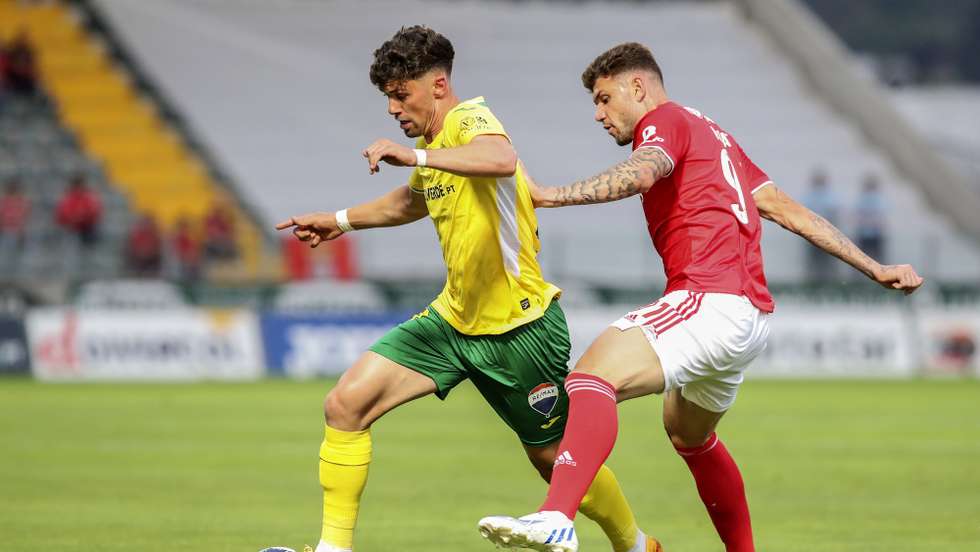 Pacos de Ferreira's Butzke (L) in action against Benfica's Morato during their Portuguese First League soccer match, held at Capital do Movel stadium, Pacos de Ferreira, Portugal, 13th May 2022. JOSE COELHO/LUSA