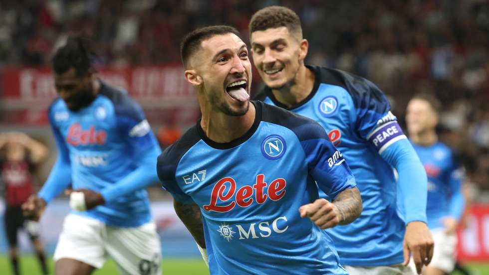 epa10192416 Napoliâ€™s Matteo Politano (R) celebrates with his teammate Giovanni Di Lorenzo after scoring the 1-0 lead from a penalty kick during the Italian serie A soccer match between AC Milan and Napoli at Giuseppe Meazza stadium in Milan, Italy, 18 September 2022.  EPA/MATTEO BAZZI