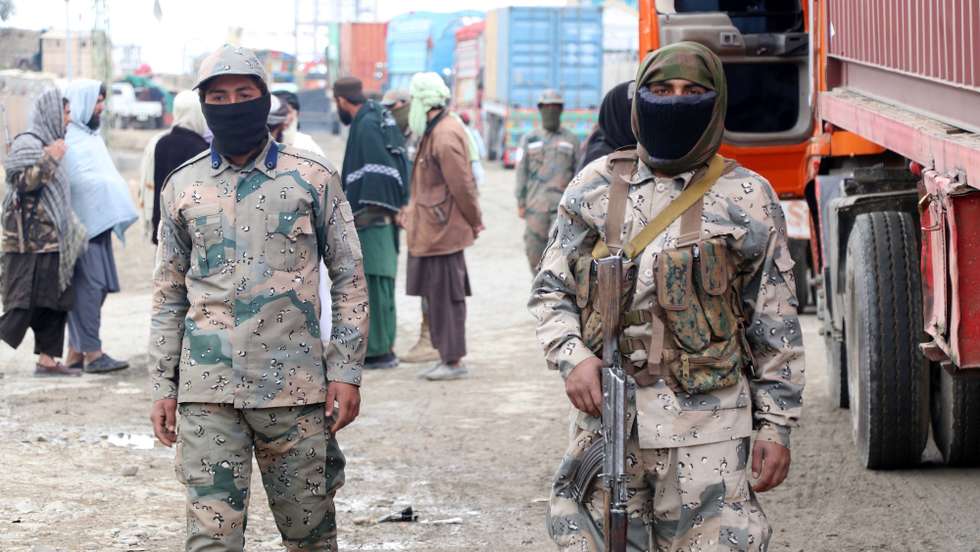 epa10361793 Taliban stand guard a day after, clashes that erupted at Afghanistan-Pakistan border in Spin Boldak, Afghanistan, 12 December 2022. At least seven people died, including six civilians, and another 27 were injured on Sunday when Afghan Taliban forces opened fire with heavy weapons on Pakistani security forces along the border between Afghanistan and Pakistan, the Pakistani army said. On the Afghan side, one member of the country's Taliban security forces was killed and 10 others were injured, including three civilians, the spokesman for the Kandahar governor, Haji Zahid said. Pakistan claims that the 2,640 kilometer (1,637 mile) border is an international frontier and has erected barbed wire along it, however, there have been some incidents of Taliban fighters removing some stretches of that fencing.  EPA/STRINGER