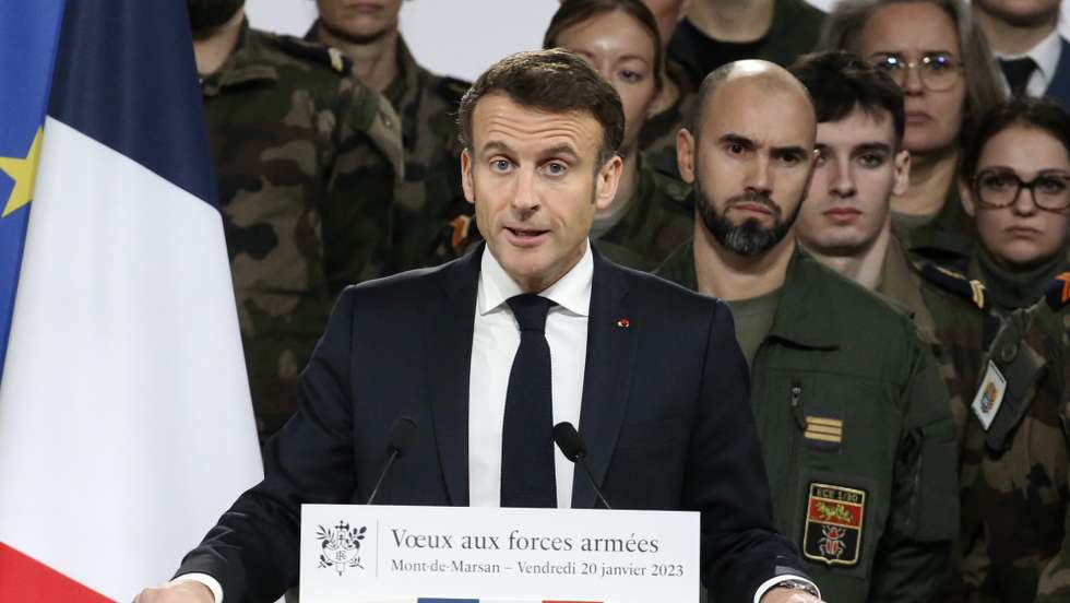 epa10418033 French President Emmanuel Macron delivers his New Year address to the French Army at the Mont-de-Marsan air base, southwestern France, 20 January 2023. French President Emmanuel Macron proposed a substantial boost in defense spending through the end of this decade and a 'transformation' of France's nuclear-armed military to face evolving threats and take into account the impact of the war in Ukraine.  EPA/BOB EDME / POOL MAXPPP OUT