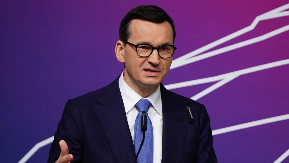 epa10408708 Polish Prime Minister Mateusz Morawiecki gestures during a festive event on the occasion of Wolfgang Schauble&#039;s 50th anniversary in parliament in Berlin, Germany, 16 January 2023. Former German Parliament &#039;Bundestag&#039; president Wolfgang Schaeuble has served for more than half a century as a member of the German parliament ‘Bundestag. He is the first deputy having participated in parliament for such a long time.  EPA/CLEMENS BILAN / POOL