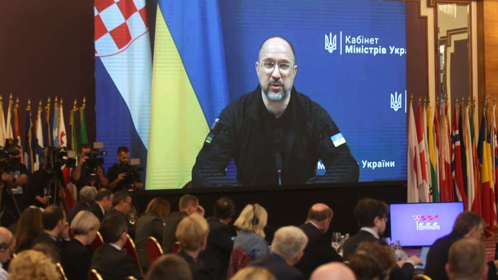 epa10912996 Prime Minister of Ukraine Denys Shmyhal addresses via video-link the International Donors Conference on Humanitarian Demining in Ukraine, in Zagreb, Croatia, 11 October 2023.  EPA/ANTONIO BAT