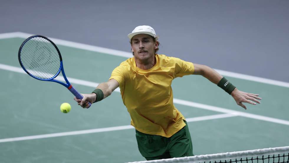 epa11605993 Max Purcell (pictured) and Matthew Ebden of Australia react against Pedro Martinez and Marcel Granollers of Spain during the third match for the first place in the Group B for the Davis Cup Finals between Spain and Australia held in Valencia, Spain, 15 September 2024.  EPA/BIEL ALINO
