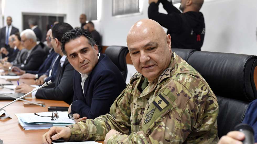 epa11761855 Commander of the Lebanese Armed Forces, General Joseph Aoun (R) attends a cabinet meeting at Benoit Barakat barracks in Tyre, southern Lebanon, 07 December 2024. The Lebanese government held a cabinet meeting in Tyre to discuss a number of issues related to the operational plan to increase the deployment of the army, a draft law for the restoration of demolished buildings and a mechanism for surveying agricultural damage, in addition to measures related to the removal of rubble, according to Lebanon's National News Agency (NNA).  EPA/WAEL HAMZEH