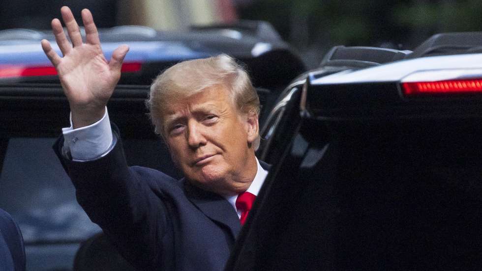 epa09312287 Former US President Donald Trump waves to pedestrians as he leaves Trump Tower in New York, New York, USA, 29 June 2021. According to news reports, prosecutors in New York District Attorney Cyrus Vance's office may unveil an indictment against the Trump Organization for allegedly failing to pay taxes on corporate benefits and perks. According to Ronald Fischetti, a New York attorney who is representing Trump, the former president is not expected to be personally charged in the case.  EPA/JUSTIN LANE