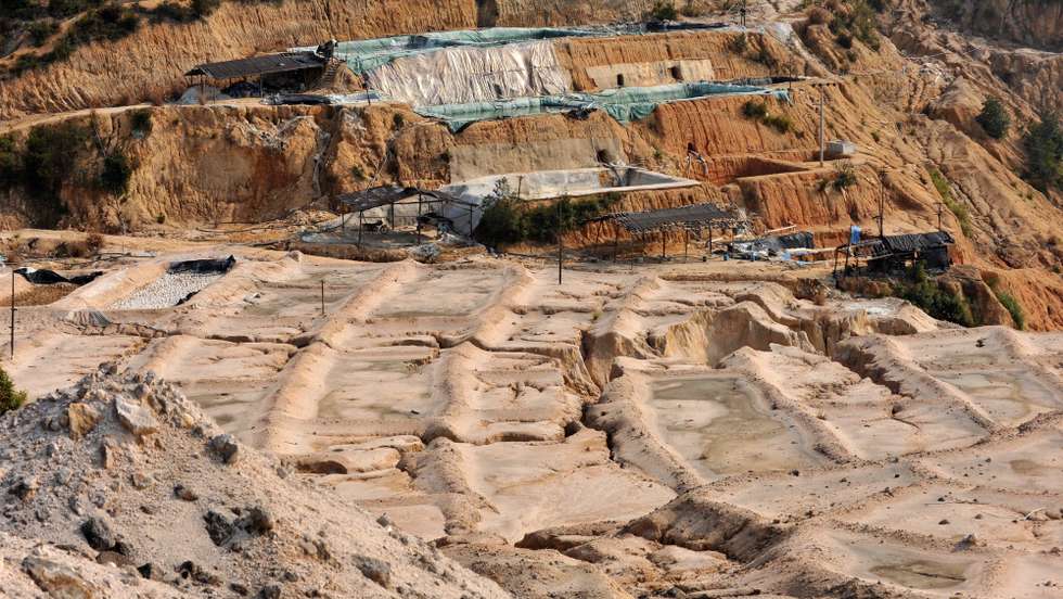 epa03097655 (FILE) A file picture made available on 09 February 2012 shows a rare earth mine in Ganxian county in central China's Jiangxi province on 30 December 2010. China exported 14,750 tons of rare earth in the first 11 months of 2011, meeting only about half of the total quota for exports for 2011.  EPA/STR CHINA OUT