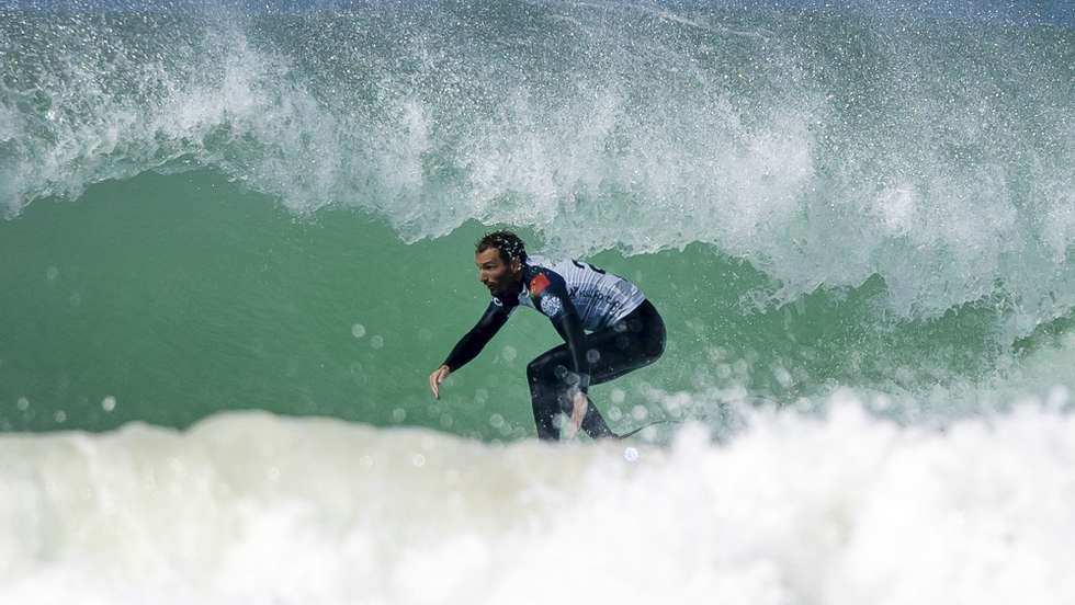 epa09805686 Portuguese surfer Frederico Morais in action during his round of 16 heat at the Meo Pro Portugal surfing event as part of the World Surf League (WSL) World Tour at Supertubos beach in Peniche, Portugal, 06 March 2022.  EPA/JOSE SENA GOULAO