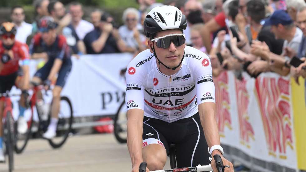 epa09965737 Portuguese rider Joao Almeida of UAE Team Emirates at the start of fifteenth stage of 105th Giro d'Italia cycling race, over 177 km from Rivarolo Canavese to Cogne, Italy, 22 May 2022.  EPA/MAURIZIO BRAMBATTI