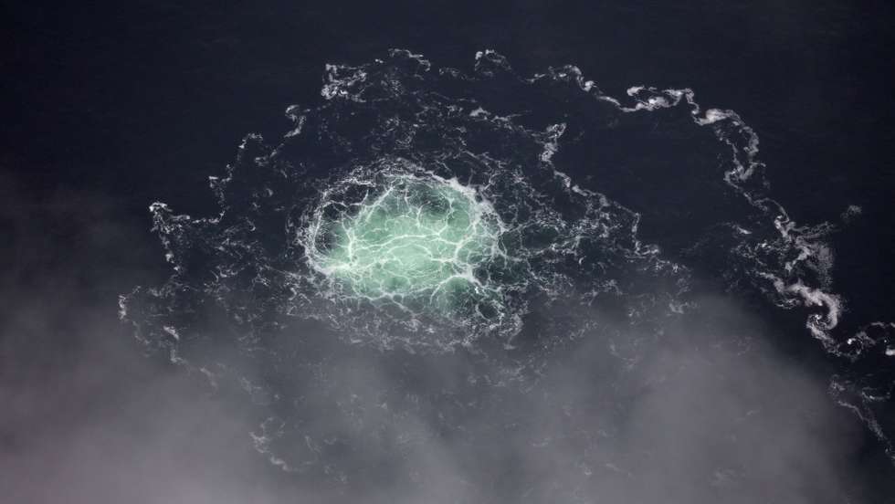 epa10213304 A handout photo made available by the Swedish Coast Guard and taken from the Swedish Coast Guard aircraft shows the small gas leak from Nord stream 2 in the Swedish economic zone in the Baltic Sea, Sweden, 28 September 2022 (issued 29 September 2022). Swedish coast guard on 29 September confirmed a fourth gas leak on the Nord Stream pipelines.  EPA/SWEDISH COAST GUARD / HANDOUT MANDATORY CREDIT: SWEDISH COAST GUARD HANDOUT EDITORIAL USE ONLY/NO SALES