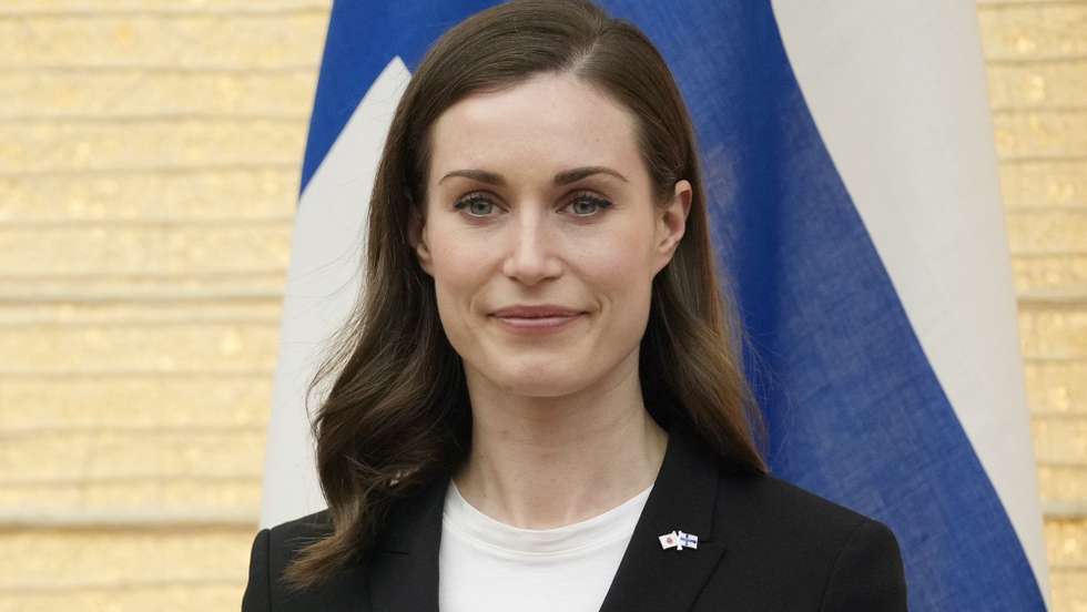epa09939756 Finland's Prime Minister Sanna Marin attends a signing ceremony at Japan’s Prime Minister (not pictured) official residence in Tokyo, Japan, 11 May 2022. Both parties signed a working holiday agreement.  EPA/FRANCK ROBICHON / POOL