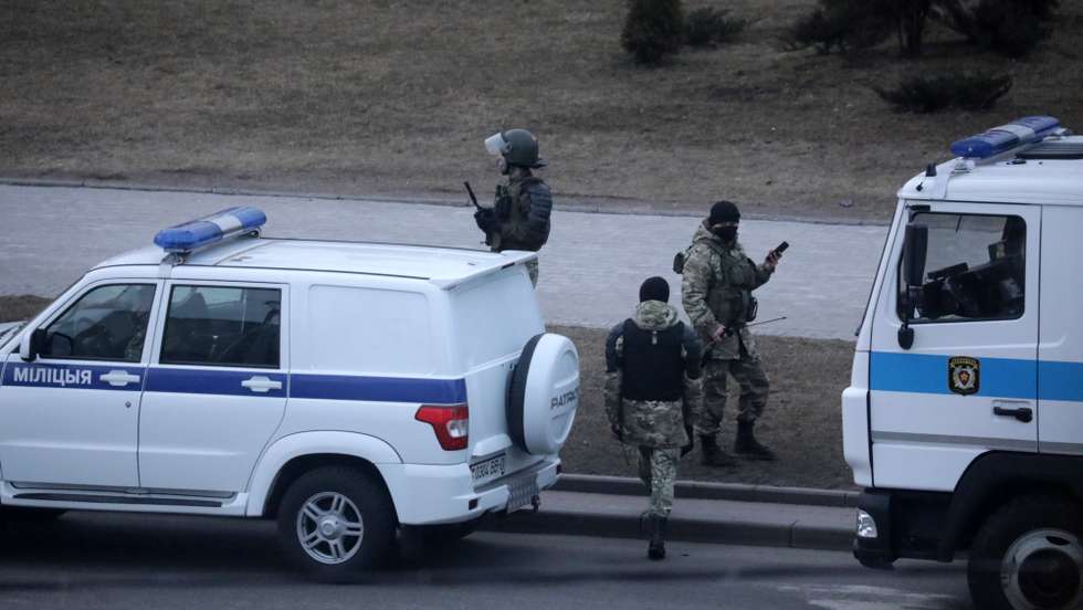 epa09097531 Belarusian policemen patrol the streets during a Freedom Day in Minsk, Belarus, 25 March 2021. Freedom Day, an unofficial holiday in Belarus, commemorates the creation of the Belarusian People's Republic (BPR) on 25 March 1918. People celebrated Freedom Day to show support to imprisoned protesters and to protest against the government of Belarusian President Lukashenko.  EPA/STR