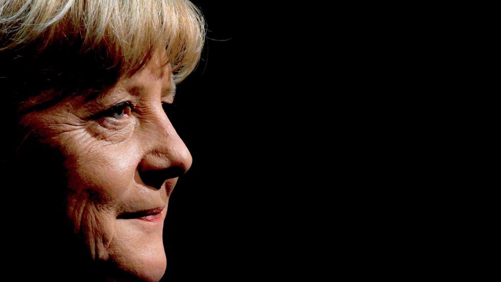 epa10001030 Former German Chancellor Angela Merkel during 'So what is my country?' conversation with Alexander Osang at the Berliner Ensemble in Berlin, Germany, 07 June 2022.  EPA/FILIP SINGER