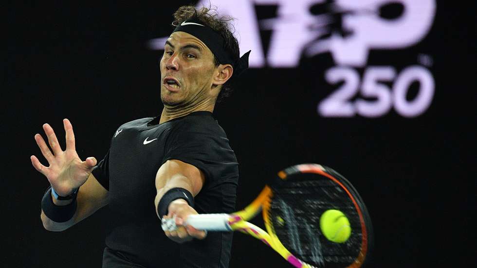 epa09675078 Rafael Nadal of Spain in action during the men’s final match against Maxime Cressy of the US on Day 7 of the Melbourne Summer Set tennis tournament at Melbourne Park in Melbourne, Australia, 09 January 2022.  EPA/JAMES ROSS  AUSTRALIA AND NEW ZEALAND OUT