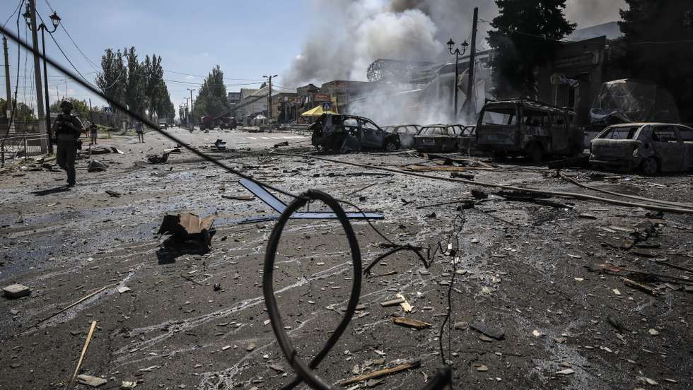 epa12279117 A handout photo made available by the press service of the 24th Mechanized Brigade of the Ukrainian Armed Forces shows the site of a Russian drone strike on a market in the frontline city of Druzhkivka in the Donetsk region, Ukraine, 02 August 2025, amid the Russian invasion. At least 5 people were injured in the Russian strike on Druzhkivka, according to Head of the Donetsk Regional Military Administration Vadym Filashkin.  EPA/PRESS SERVICE OF THE 24 MECHANIZED BRIGADE HANDOUT  HANDOUT EDITORIAL USE ONLY/NO SALES