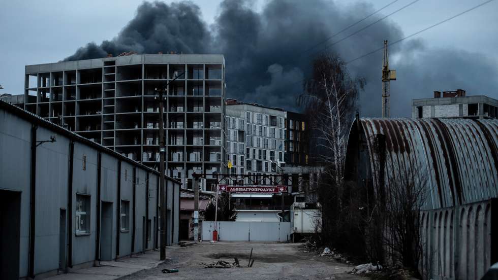 epa09851914 Smoke rises outside Lviv after a Russian airstrike, in Lviv, western Ukraine, 26 March 2022. Lviv Oblast governor Kozytskiy in a statement said three explosions were heard near Kryvchytsia and urged citizens to not reveal the locations on social media. On 24 February Russian troops had entered Ukrainian territory in what the Russian president declared a 'special military operation', resulting in fighting and destruction in the country, a huge flow of refugees, and multiple sanctions against Russia.  EPA/Wojtek Jargilo POLAND OUT
