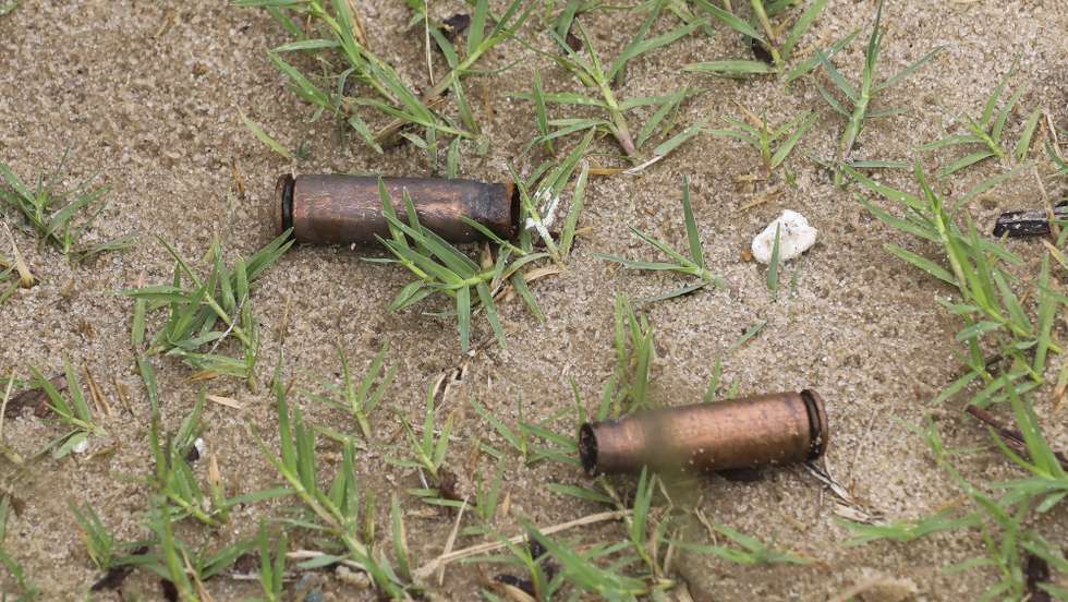 epa09131133 Spent AK rifle capsules in the street of Palma, Cabo Delgado, Mozambique, 12 April 2021. The violence unleashed more than three years ago in Cabo Delgado province escalated again about two weeks ago, when armed groups first attacked the town of Palma.  EPA/JOAO RELVAS