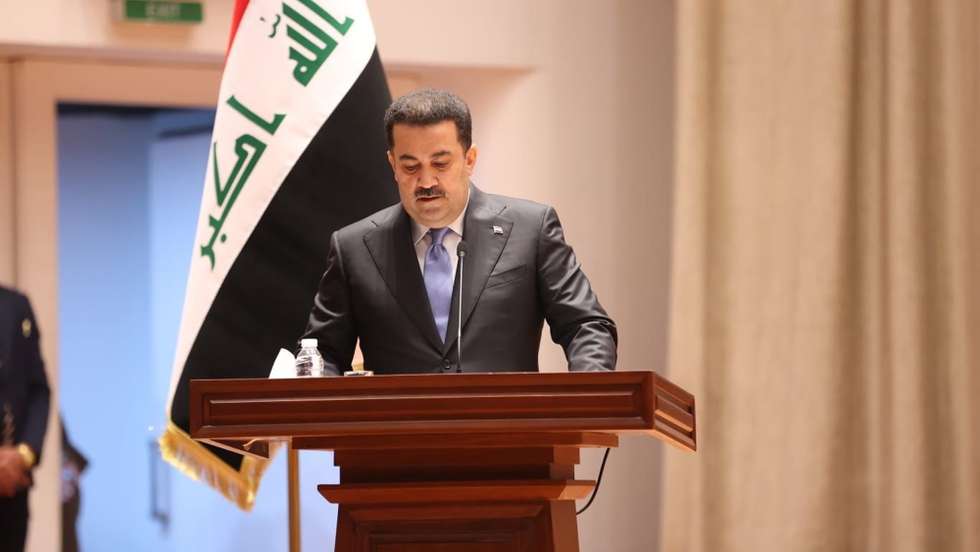 epa10269698 A handout photo made available by Iraqi Prime Minister office shows Iraqi designated Prime Minister Mohammed Shia' al-Sudani as he speaking during the Iraqi parliament session in Baghdad, Iraq, 27 October 2022. Iraq's parliament convened late 27 October, with the majority of parliamentarians voting for Iraq's Prime Minister al-Sudani's cabinet after a one year of political crisis to form new Iraqi government.  EPA/IRAQI PRIME MINISTER OFFICE / HANDOUT  HANDOUT EDITORIAL USE ONLY/NO SALES