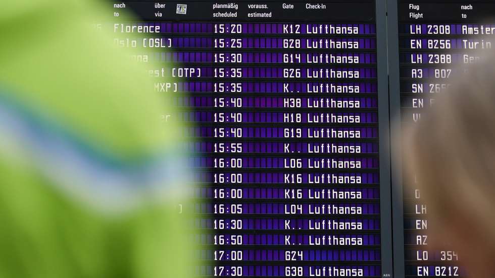 epa12730050 A view of screens for departures in Terminal 2 during a strike at the international airport in Munich, Germany, 12 February 2026. Pilots and cabin crew are striking at Lufthansa and Lufthansa Cargo. In addition to the hubs in Frankfurt and Munich, airports in Hamburg, Bremen, Stuttgart, Cologne, Duesseldorf, Berlin, and Hanover are also directly affected.  EPA/RONALD WITTEK