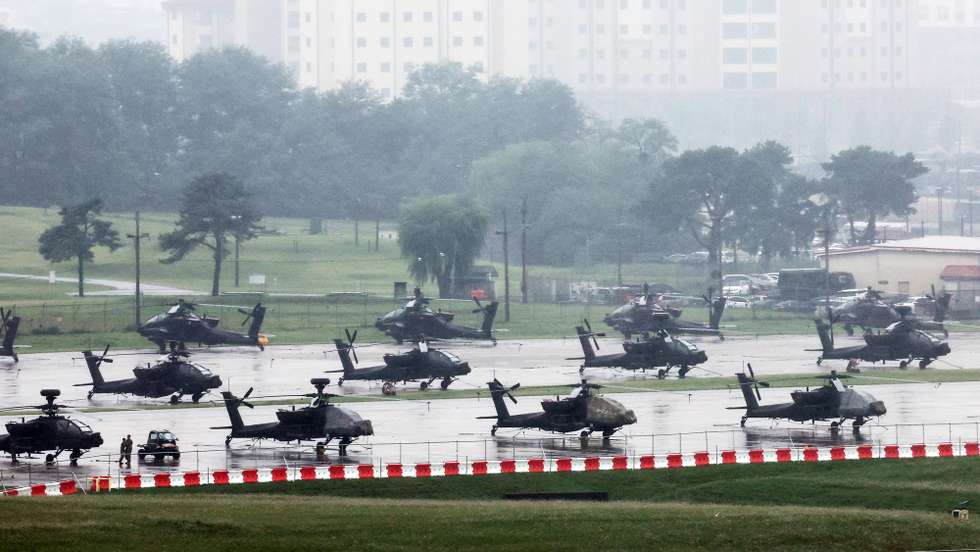 epa13182152 US Apache attack helicopters are parked at US Camp Humphreys in Pyeongtaek, south of Seoul, South Korea, 21 August 2026. South Korea and the United States were set to wrap up their key military exercise the same day, nearly a week ahead of its original schedule after US President Donald Trump ordered a significant reduction in a move widely seen as a conciliatory gesture toward North Korean leader Kim Jong Un. The allies have agreed to cut short the Ulchi Freedom Shield exercise, which was scheduled to run from 17 to 27 August, to 21 August, paring down the drills period almost by half.  EPA/YONHAP SOUTH KOREA OUT