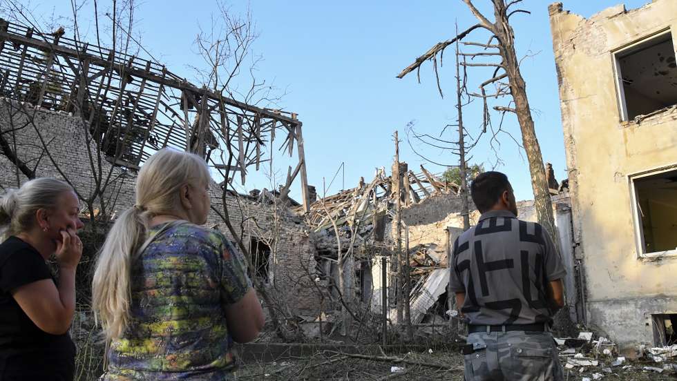epa11583436 Local people gather at the site of a combined Russian strike that hit a residential area in Lviv, western Ukraine, 04 September 2024, amid the ongoing Russian invasion. At least seven people died, including three children, and 35 others were injured as a result of a Russian combined attack by shock drones and rockets of different types in Lviv, according to Lviv Mayor Andriy Sadovy. Russian troops entered Ukrainian territory on 24 February 2022, starting a conflict that has provoked destruction and a humanitarian crisis.  EPA/MYKOLA TYS