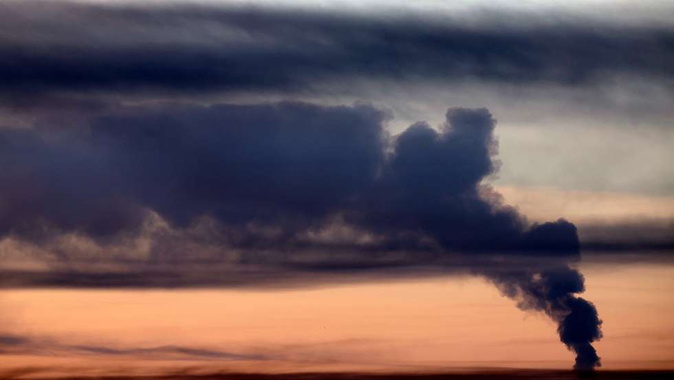 epa13122821 Smoke rises near the town of Domodedovo following a Ukrainian drone attack in the Moscow Region, Russia, 20 July 2026. According to Governor Andrey Vorobyov, 10 people, including a child, were injured in the drone attack on the Moscow region.  EPA/STRINGER