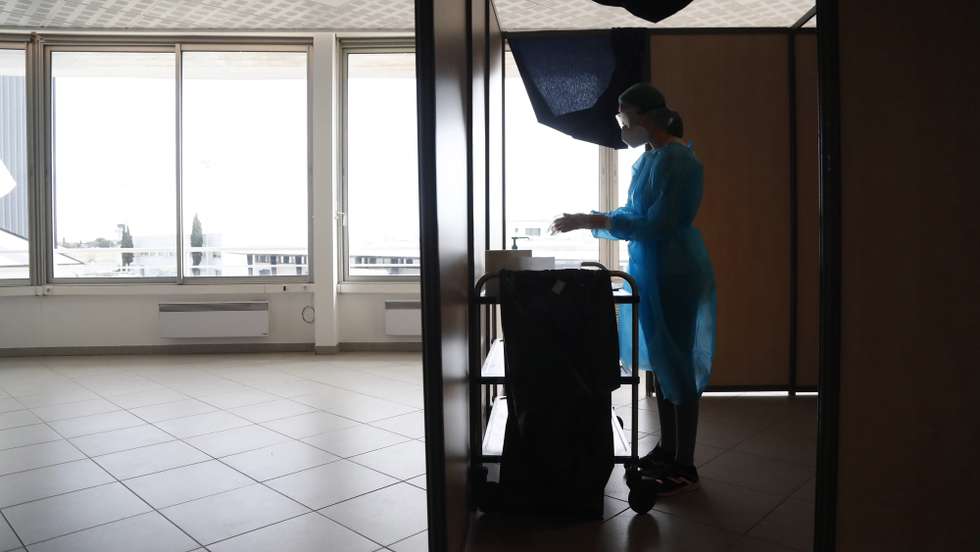 epa08998579 A medical worker prepares to take nasal swab samples at a test station for Covid-19 coronavirus in Montpellier, France, 09 February 2021. The top French medical authority (Haute autorite de Sante) has approved the vaccine AstraZeneca-Oxford for use in France, but only for people under 65, echoing decisions made in Sweden, Germany, Belgium and Switzerland over concerns about a lack of data on the effectiveness of the vaccine for over 65s.  EPA/GUILLAUME HORCAJUELO
