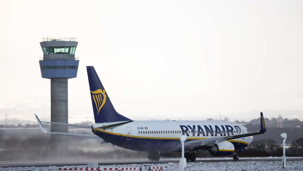 epa11811083 A Boeing 737 of Ryanair takes off from Liverpool John Lennon airport after flights had earlier been delayed and cancelled as snow fell in Liverpool, Britain, 07 January 2025. The Met Office has issued further yellow warnings for snow and ice across Northern Ireland and the west coast of Britain after heavy snowfall and rain caused widespread travel disruption and flooding.  EPA/ADAM VAUGHAN