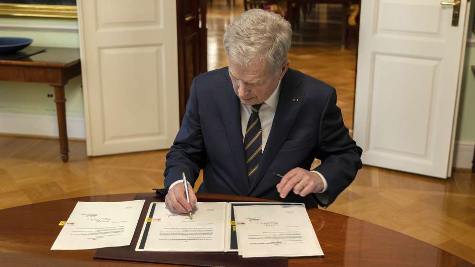 epa10538776 Finland's President Sauli Niinisto signs the Nato Law in Helsinki, Finland, 23 March 2023. The Finish president signed the legislation on the country's accession to the North Atlantic Treaty Organization (NATO) after Parliament passed the bill on 01 March 2023. Finland will become a member of NATO once the last two NATO member states, Turkey and Hungary, have ratified Finland's bid to join the military alliance. Finland and Sweden submitted applications to join NATO following Russia's invasion of Ukraine in 2022.  EPA/MAURI RATILAINEN