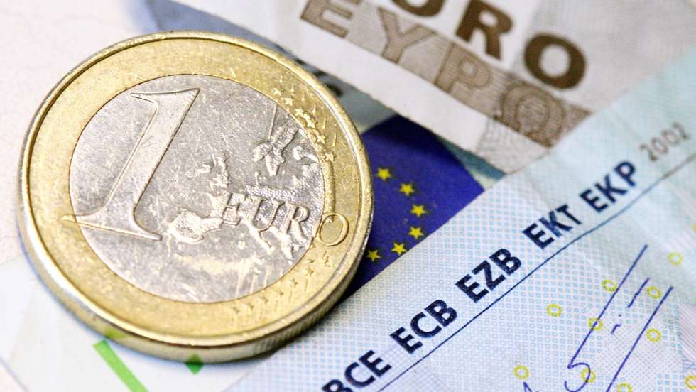 Notas e moeda de Euros