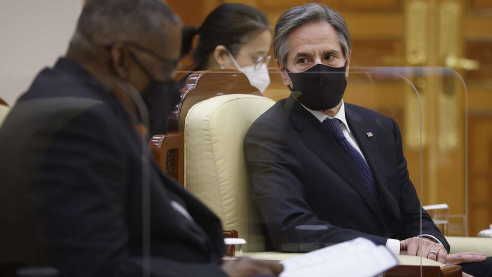 epa09081079 US Defense Secretary Lloyd Austin (L) speaks as US Secretary of State Antony Blinken (R) looks on during a meeting with South Korean President Moon Jae-in (not pictured) at the Presidential Blue House in Seoul, South Korea, 18 March 2021. Blinked and Austin are on a two-day official visit to South Korea.  EPA/KIM HONG-JI / POOL