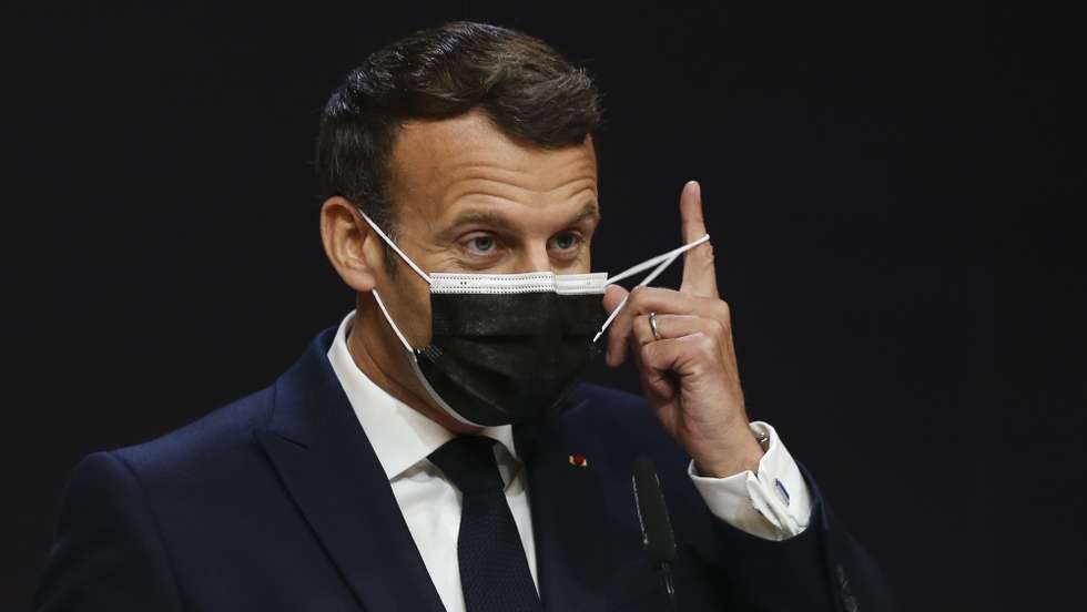 French President Emmanuel Macron attends a press conference at the end of an Informal Meeting of EU Heads of State and Government held at Palacio de Cristal in Porto, Portugal, 08 May 2021. The European Union leaders met for a summit in Portugal, sending a signal they see the threat from COVID-19 on their continent as waning amid a quickening vaccine rollout. Their talks hope to repair some of the damage the coronavirus has caused in the bloc, in such areas as welfare and employment. JOSE COELHO/POOL/LUSA