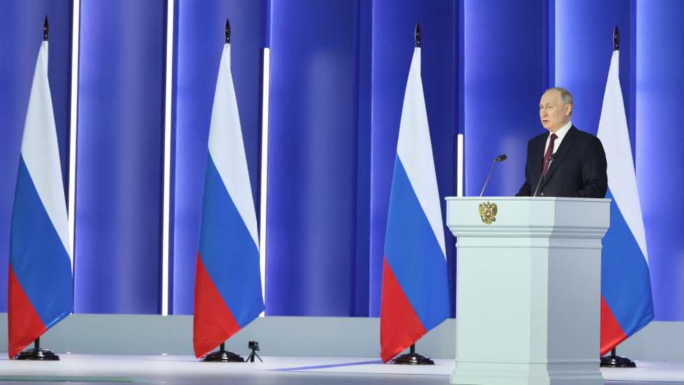 epa10481569 Russia's President Vladimir Putin delivers his annual address before the Federal Assembly at the Gostiny Dvor conference center in Moscow, Russia, 21 February 2023. 'The goal of the West is to inflict a strategic defeat on Russia, to end us once and for all. We will react accordingly, because we are talking about the existence of our country', Putin said during his state of the nation address. About 1,200 people, including lawmakers of Russiaâ€™s two-chamber parliament, Government members, heads of the Constitutional and Supreme court, and regional governors, were invited to attend the event.  EPA/SERGEY SAVASTYANOV/SPUTNIK/KREMLIN POOL MANDATORY CREDIT