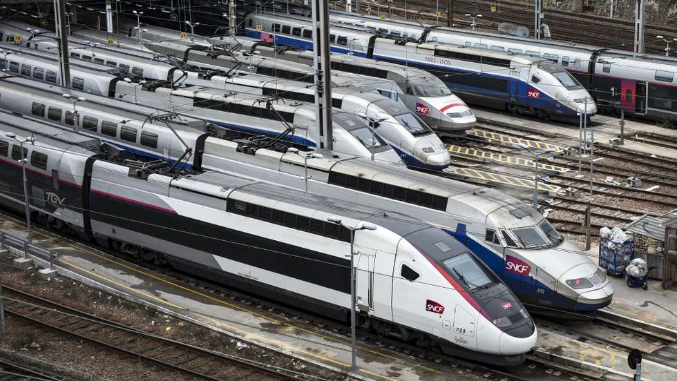 epa06619826 French TGV trains sit in the train depot of France's national rail network SNCF in Charenton-le-pont, during a nation-wide strike day affecting public transport, namely SNCF train travel, outside Paris, France, 22 March 2018. A national strike day was called by public sector workers and labor unions to defend labor rights and pensions.  EPA/IAN LANGSDON