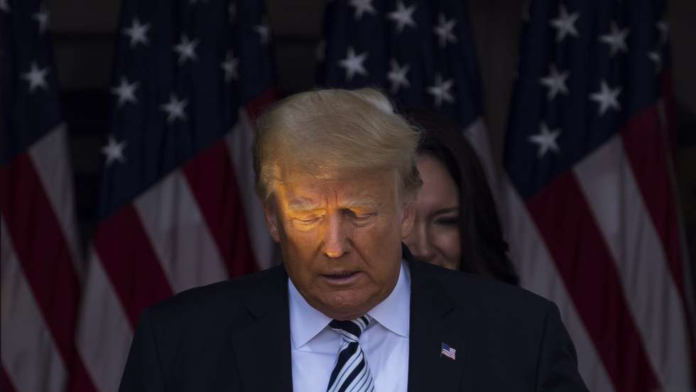 epa09329217 Former US President Donald J. Trump arrives for a press conference at Trump National Golf Club Bedminster in Bedminster, New Jersey, USA, 07 July 2021. At the event, Trump announced plans to file a class action lawsuit against Facebook and Twitter for alleged censorship.  EPA/JUSTIN LANE