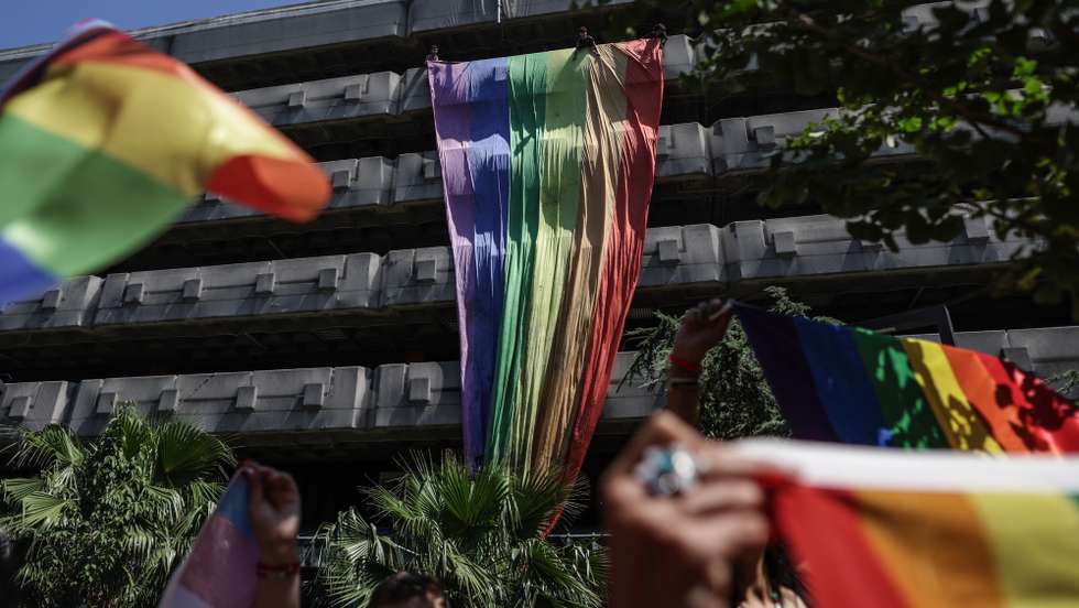 epa10710754 LGBT (lesbian, gay, bisexual, transgender) community members and supporters hold rainbow-colored flags and shout slogans during the Pride March in Istanbul, Turkey, 25 June 2023. The Turkish Government has banned the Istanbul Pride March as they already did in previous years.  EPA/ERDEM SAHIN