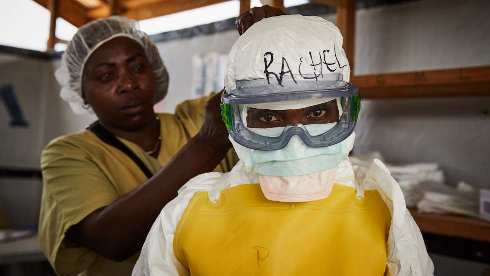 epa08891329 (20/39) Rachel Rukwati suits up in PPE to enter a high-risk treatment zone, at the peak of the Ebola crisis, at a health centre in Beni, North Kivu, Democratic Republic of Congo, 04 May 2019. Rachel was a health worker attached to the Ebola response and has first-hand experience of combating an unfamiliar virus. 'In the Ebola response I was a nurse, I took care of ill people, confirmed, and unconfirmed cases when they were at the CTE.In fact, the time we were entering the high-risk zone, we used to get fear, that fear was pushing us to leave the high-risk zone quickly. And when we wore the PPE costume or the protected material we were feeling muffled, then when you leave, you felt at ease because you return to your familiar feeling, compared to how you just felt breathing. The fear I had, was that I could get contaminated as a nurse. When I went to treatment zones I had fear.Since I left the response, I feel that I haven’t recovered my health as it was before… the feeling we used to get in the treatment centers, we sense there are some things we lost.As coronavirus spreads, to the world, from myself as a health worker from Beni, and the Ebola response; I would tell them that when they notice the virus in their town, they should first accept it like a disease, not like politics, they will not be able to fight it like that. When you react to a disease, you will overcome it, using measures and precautions.' EPA/Hugh Kinsella Cunningham ATTENTION EDITORS / MANDATORY CREDIT : This story was produced in partnership with the Pulitzer Center -- For the full PHOTO ESSAY text please see Advisory Notice epa...