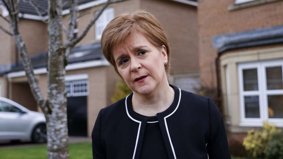 epa09091059 First Minister and SNP leader Nicola Sturgeon leaves her home in Glasgow, the morning after an independent inquiry concluded she did not breach the ministerial code in her actions following harassment allegations made against her predecessor Alex Salmond, Glasgow, Britain, 23rd March 2021.  EPA/Robert Perry