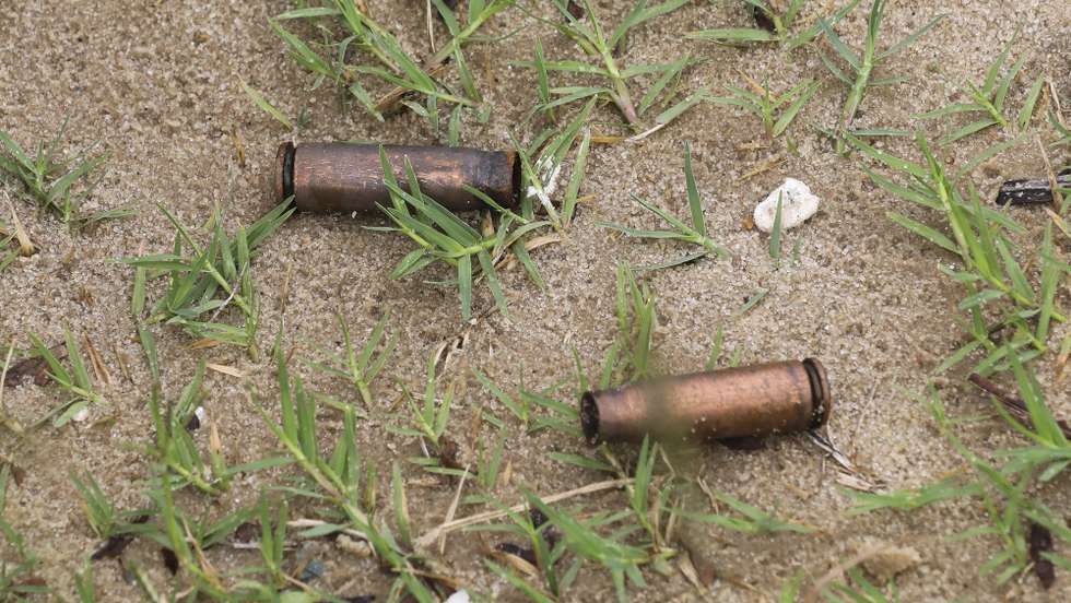 epa09131133 Spent AK rifle capsules in the street of Palma, Cabo Delgado, Mozambique, 12 April 2021. The violence unleashed more than three years ago in Cabo Delgado province escalated again about two weeks ago, when armed groups first attacked the town of Palma.  EPA/JOAO RELVAS