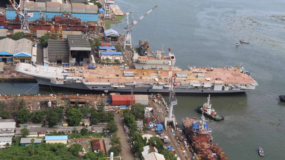 epa04792425 A handout photograph provided by the Indian Ministry of Defence shows INS Vikrant being undocked at Cochin Shipyard Limited at Kochi, India, 10 June 2015. INS Vikrant, India's largest aircraft carrier will be inducted in the Indian Navy after a series of trials at an yet unspecified date.  EPA/INDIAN MINISTRY OF DEFENCE / HANDOUT INDIAN MINISTRY OF DEFENCE / HANDOUT EDITORIAL USE ONLY/NO SALES/NO ARCHIVES. HANDOUT EDITORIAL USE ONLY/NO SALES